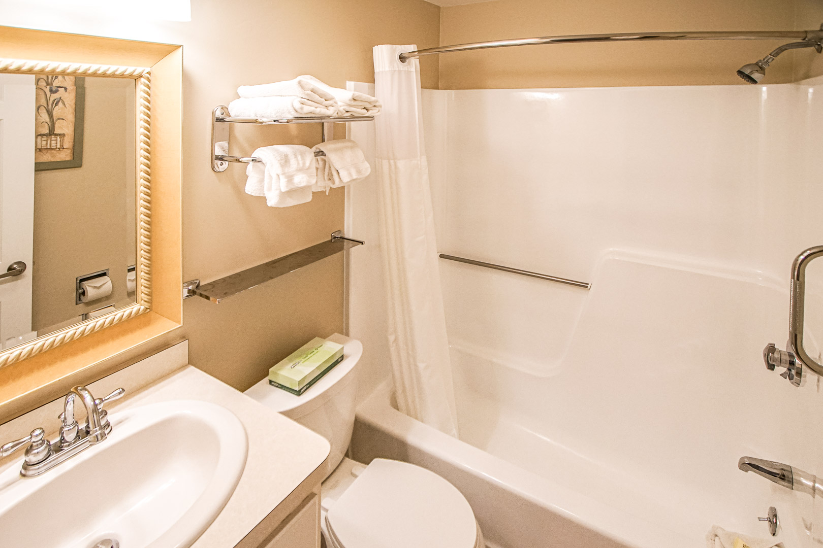 A clean and standard bathroom at VRI's Cape Winds Resort in Massachusetts.